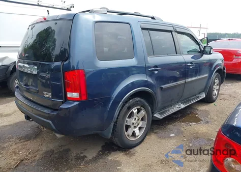 2011 Honda Pilot Touring z USA, uszkodzony, nr VIN 5FNYF4H93BB072200